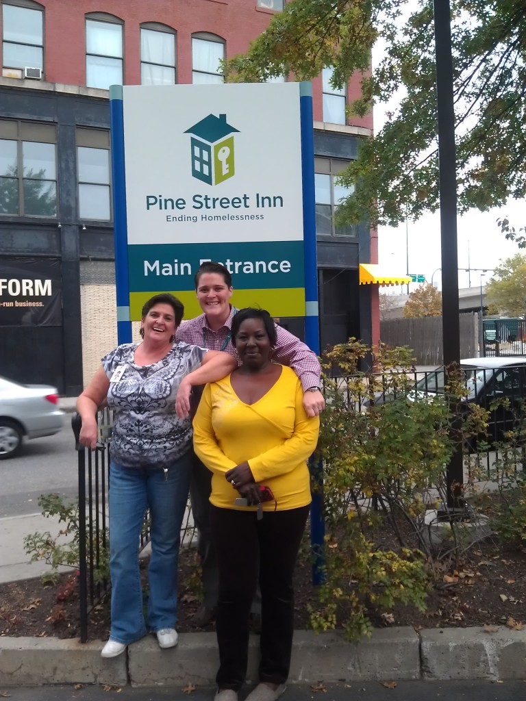 (Clockwise from back) Elizabeth Condron, Sharron Dillard, and Jennifer Payne at Pine Street's main entrance.